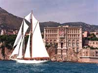 Yacht passing Oceanographic Museum and Aquarium